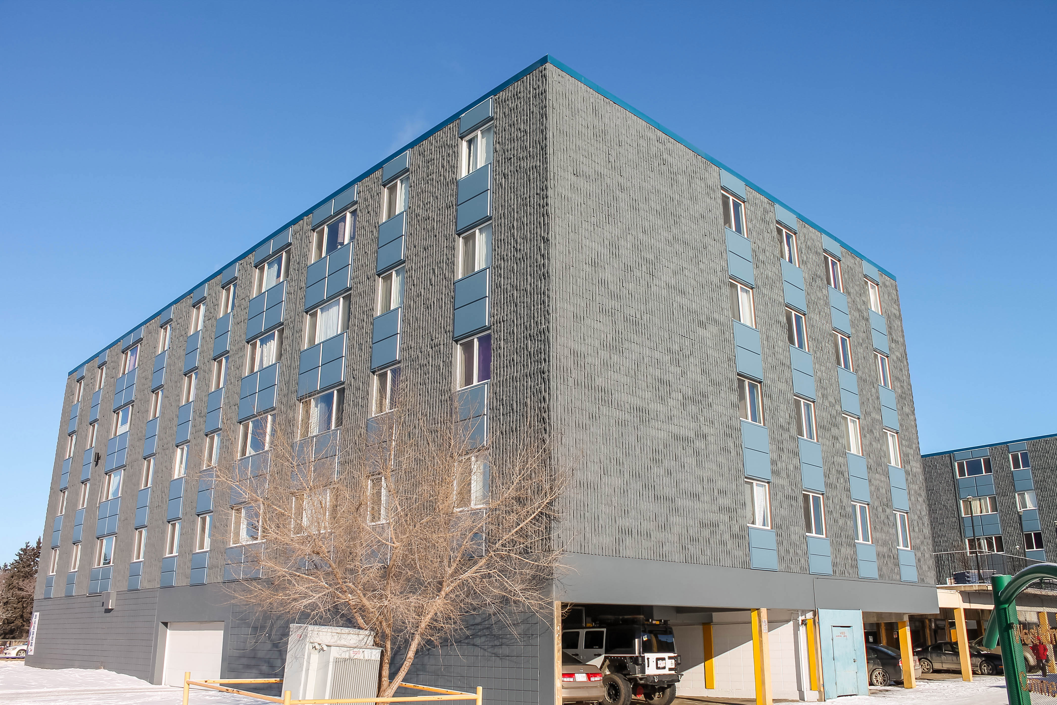 StrataClad Panels,Beveled Metal Cladding,Durable Cladding Solutions,Exterior Metal Panels,Precision Metal Cladding,Lenmak Cladding,Innovative Building Panels,Edmonton Cladding Experts,Quality Metal Panels,Advanced Cladding Technology