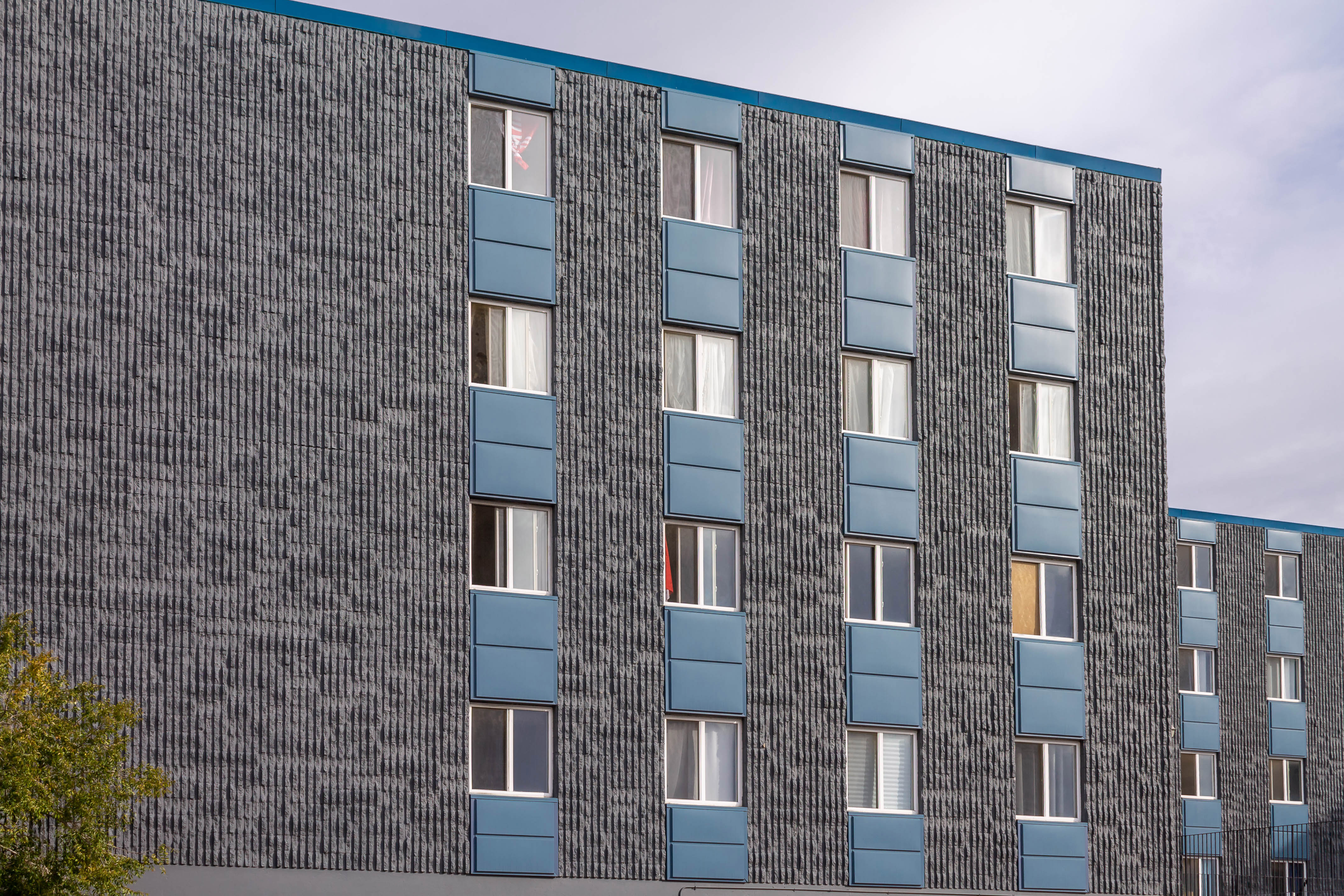 StrataClad Panels,Beveled Metal Cladding,Durable Cladding Solutions,Exterior Metal Panels,Precision Metal Cladding,Lenmak Cladding,Innovative Building Panels,Edmonton Cladding Experts,Quality Metal Panels,Advanced Cladding Technology